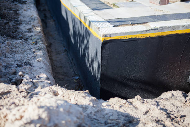 Professional Waterproofing technician working in Leesburg, NJ
